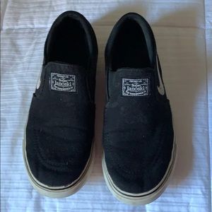 Nike boys black slip ons shoes. Stefan Janoski.